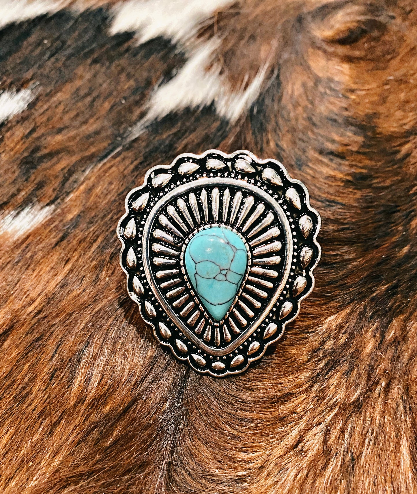 Silvertone and turquoise stone teardrop ring
